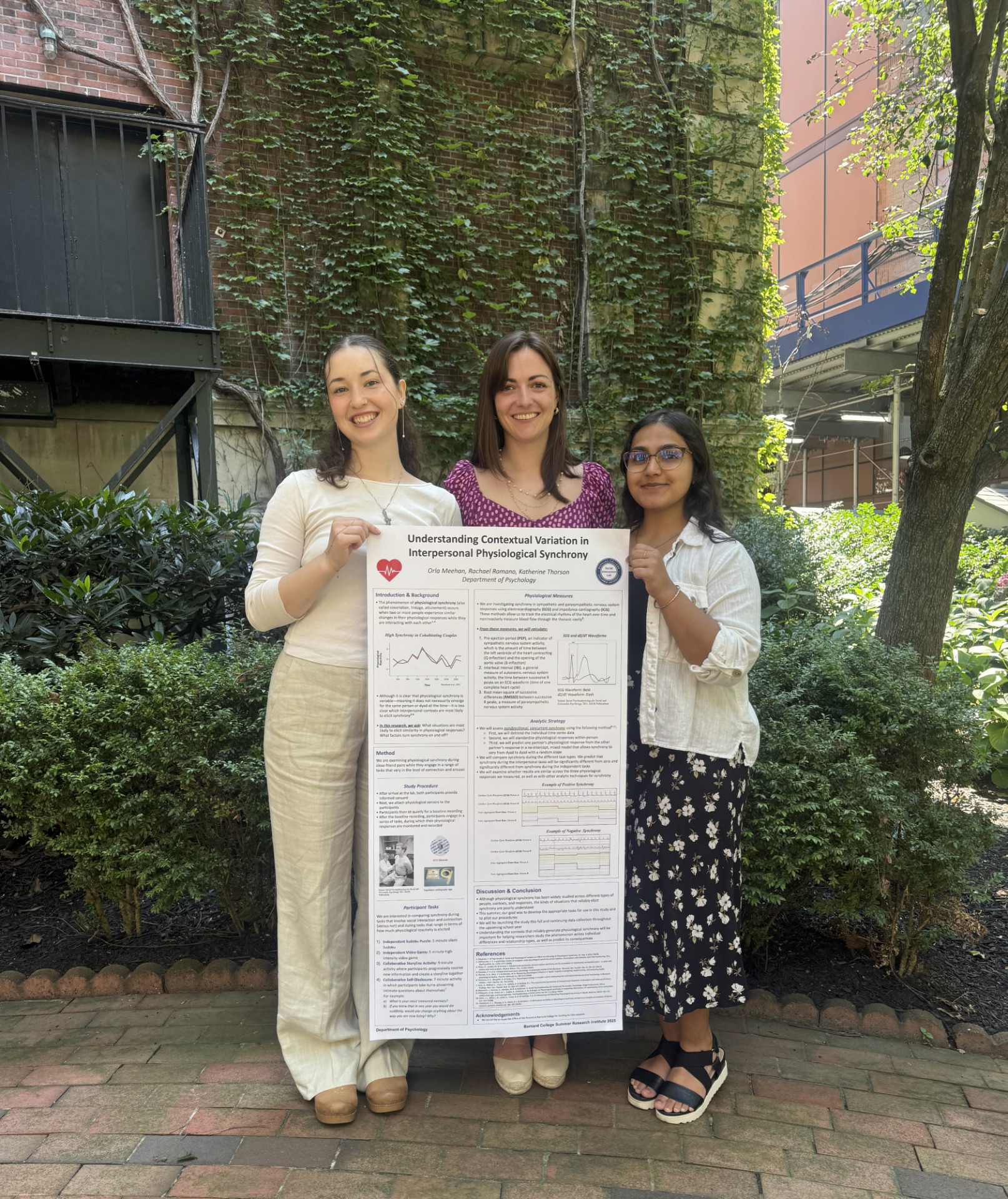 Orla Meehan and Rachael Romano presenting their poster at the SRI 2025 Poster Session with their mentor, Kate Thorson